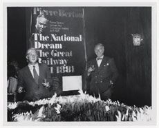 Jack McClelland and Pierre Berton celebrate the launch of The National Dream, 1970. William Ready Division, McMaster University Library 